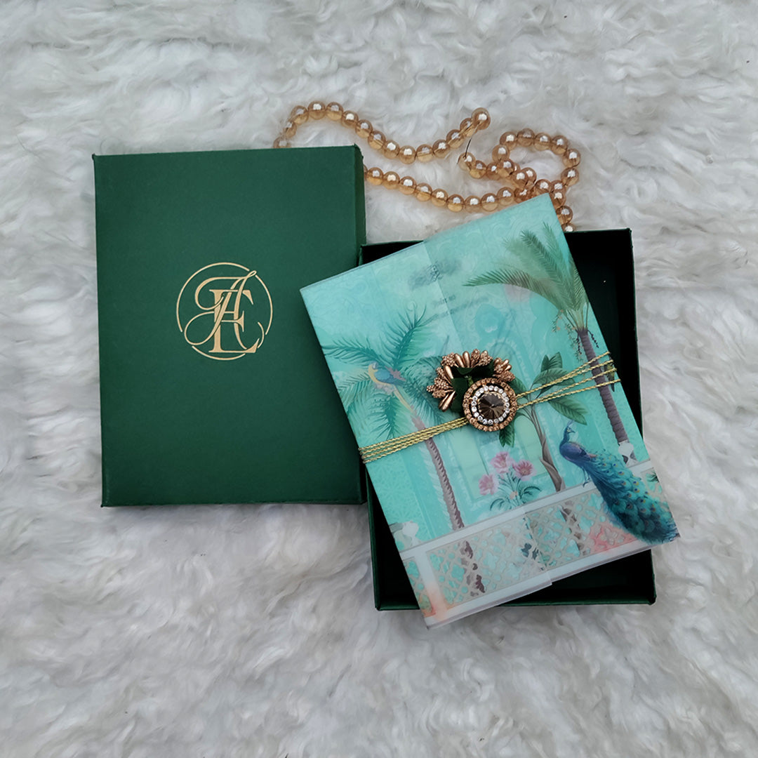 Green Wedding Card box with gold monogram, Printed Vellum Paper wrapped in Peacock Theme and decoratives