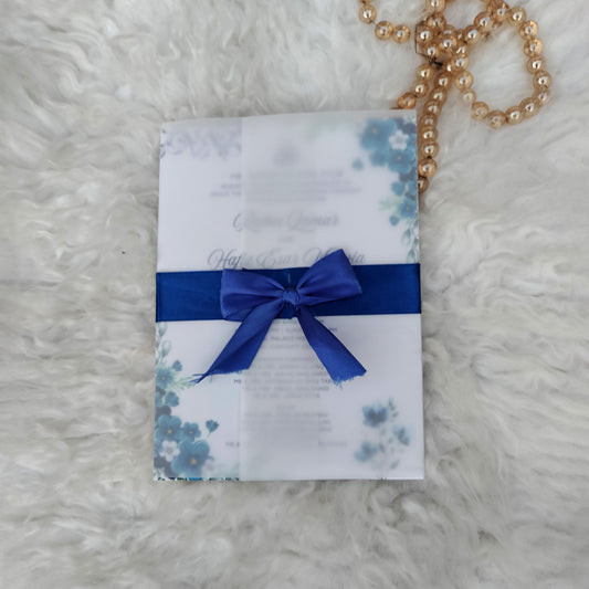 Vellum Paper Wedding Card wrapped in Blue Ribbon with a knot, Custom Wedding Card, Wedding Card Pakistan, Blue Floral Wedding Invitation