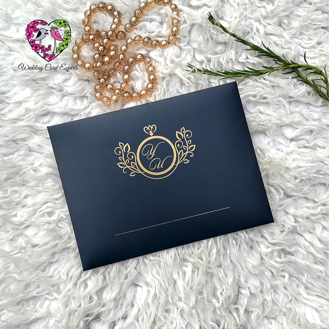 Black and gold monogram wedding invitation pouch envelope with couple initials – Wedding Card Experts