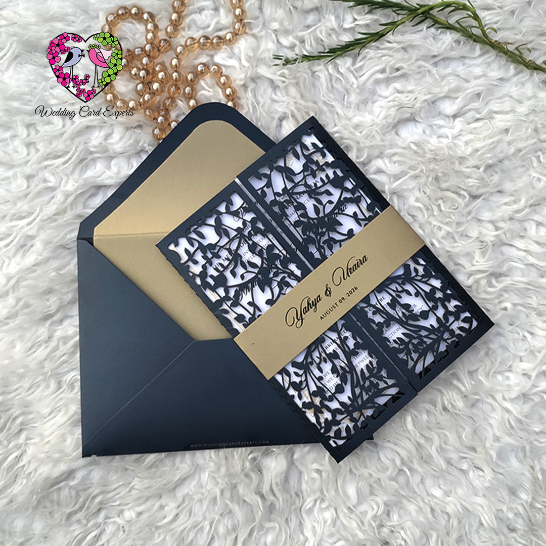Black and gold laser cut wedding card Pakistan with gold-lined envelope – Wedding Card Experts Lahore