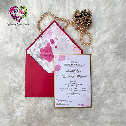 Floral wedding invitation Pakistan, crimson envelope with printed rose lining, gold border wedding card, custom Pakistani wedding invitations, WeddingCardExperts.com