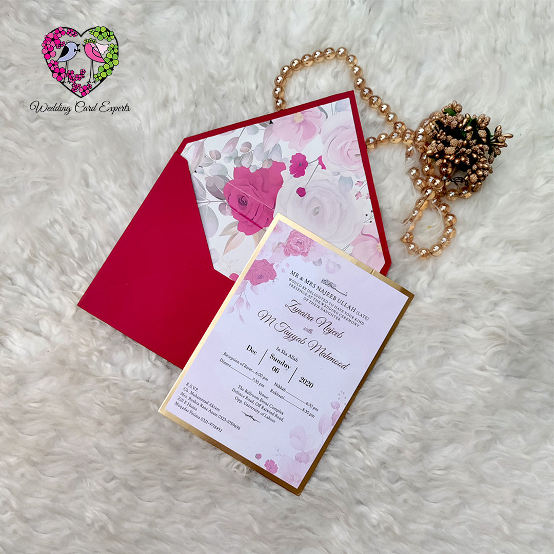 Close-up pink and white rose floral wedding card, gold border, elegant Pakistani wedding invitation card, wedding cards Lahore, Wedding Card Experts