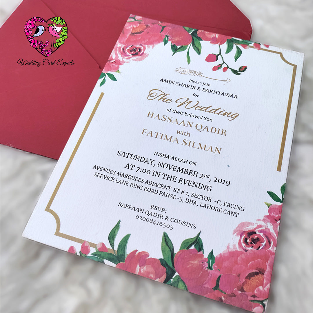 Close-up pink peony floral shadi card, gold border frame, Bismillah calligraphy, custom Pakistani wedding invitation card, WeddingCardExperts.com