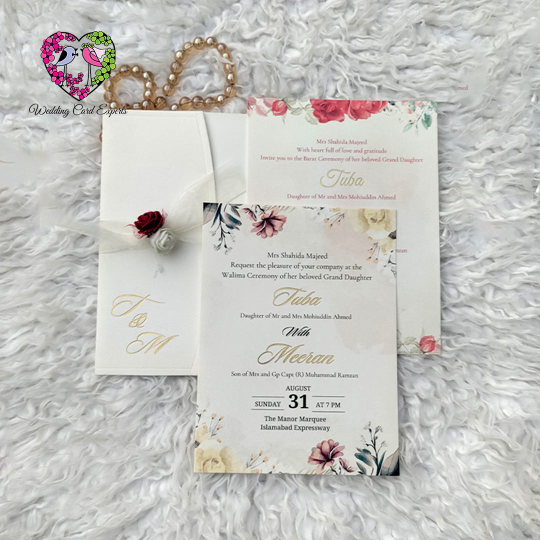 Floral Barat and Walima Pakistani wedding cards suite with ivory 
pocket envelope, gold foil monogram and fabric rose detail